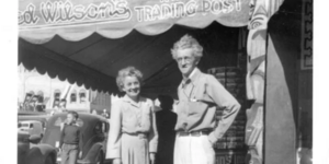 Black and white photo of Fred Wilson with his wife, Ruth Wilson standing in front of their trading post